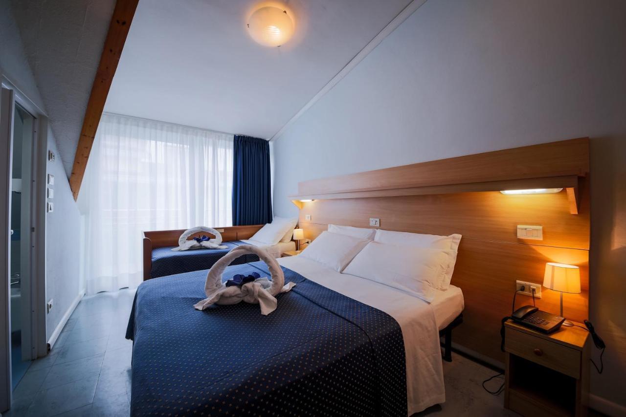 Hotel Mimosa Lignano Sabbiadoro Esterno foto