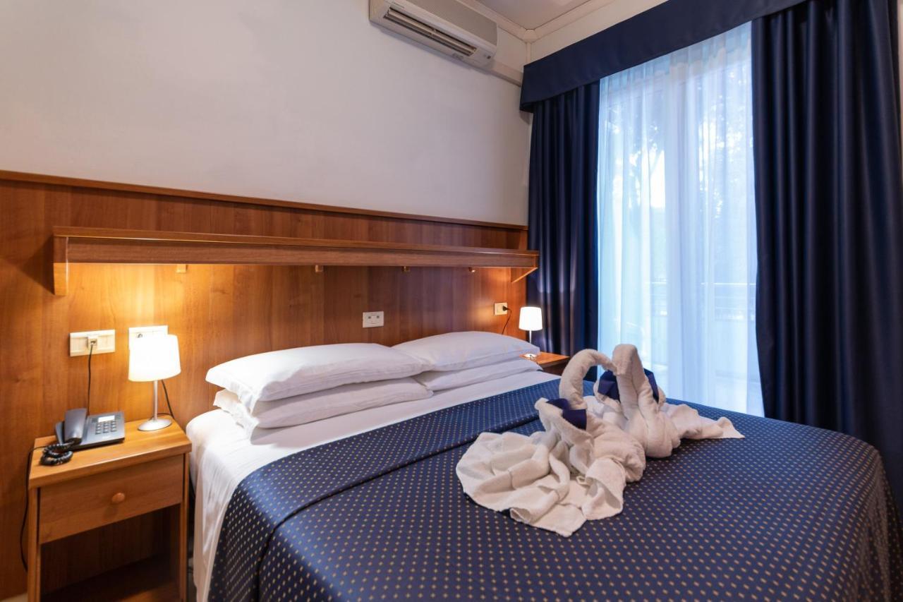 Hotel Mimosa Lignano Sabbiadoro Esterno foto
